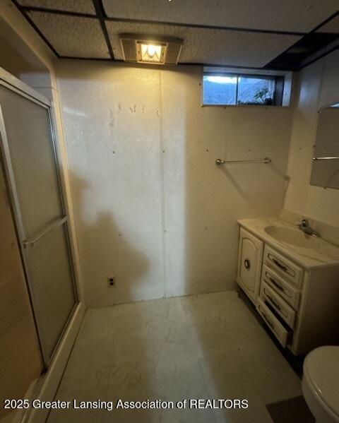 9882 W M 21, Ovid, MI 48866 - bathroom with vanity, toilet, and a stall shower