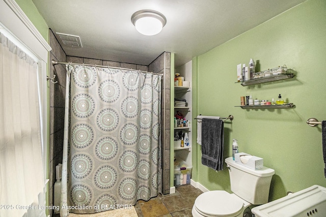 1417 W Ottawa St, Lansing, MI 48915 - bathroom with toilet and a shower with shower curtain