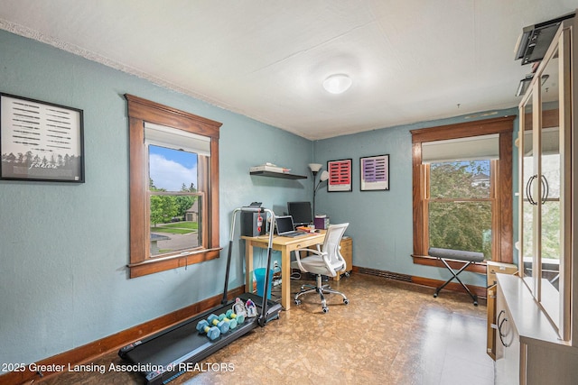 1417 W Ottawa St, Lansing, MI 48915 - office area featuring tile patterned floors, baseboards, and a textured wall