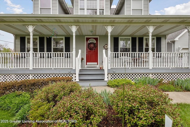 1990 S Waverly Rd, Eaton Rapids, MI 48827 - view of front of house with a porch