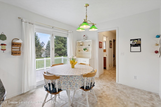 1990 S Waverly Rd, Eaton Rapids, MI 48827 - dining room featuring baseboards and light tile patterned flooring