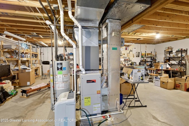 1990 S Waverly Rd, Eaton Rapids, MI 48827 - unfinished basement with water heater