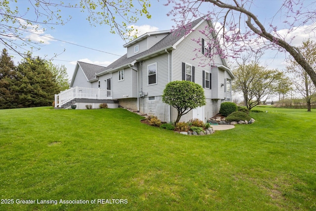 1990 S Waverly Rd, Eaton Rapids, MI 48827 - view of side of property with a yard and roof with shingles