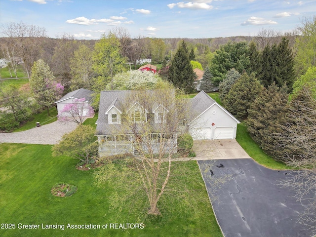 1990 S Waverly Rd, Eaton Rapids, MI 48827 - view of subject property with a forest