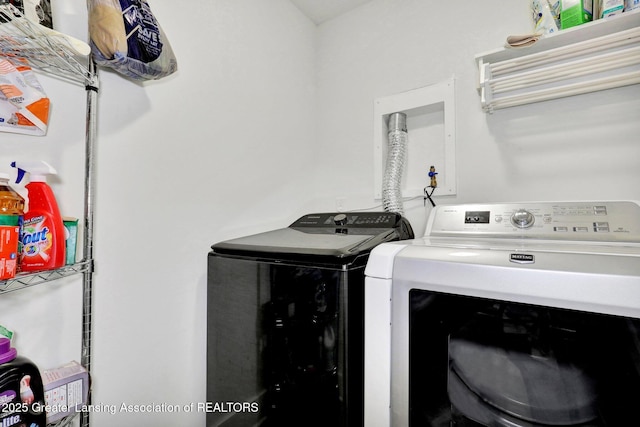 4269 Tamarack St, Holt, MI 48842 - washroom with washer and clothes dryer