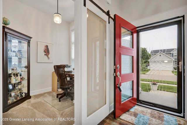 4269 Tamarack St, Holt, MI 48842 - foyer entrance featuring baseboards and a barn door