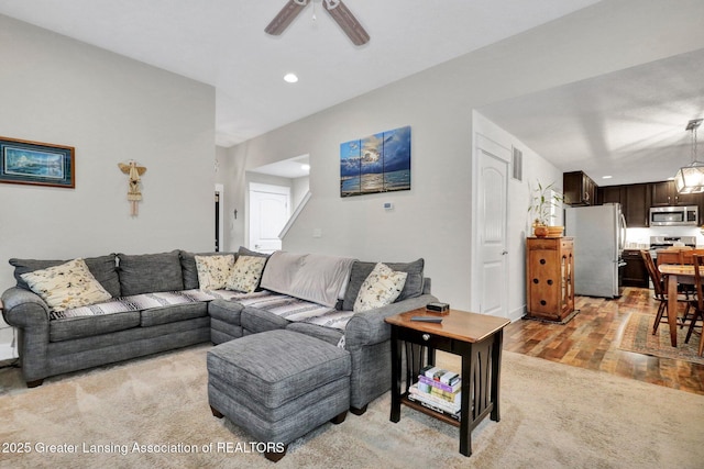 4269 Tamarack St, Holt, MI 48842 - living room with a ceiling fan, light wood finished floors, light colored carpet, and recessed lighting