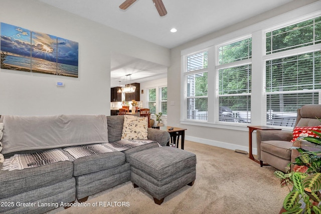 4269 Tamarack St, Holt, MI 48842 - living area featuring a chandelier, carpet floors, baseboards, a ceiling fan, and recessed lighting