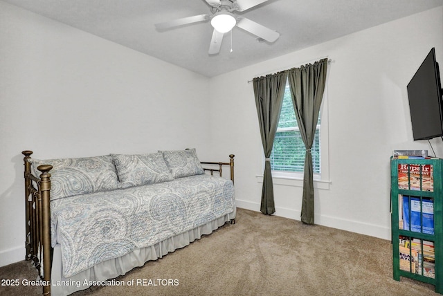 4269 Tamarack St, Holt, MI 48842 - bedroom featuring carpet, baseboards, and ceiling fan