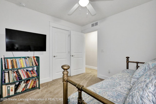 4269 Tamarack St, Holt, MI 48842 - bedroom featuring carpet, baseboards, and ceiling fan
