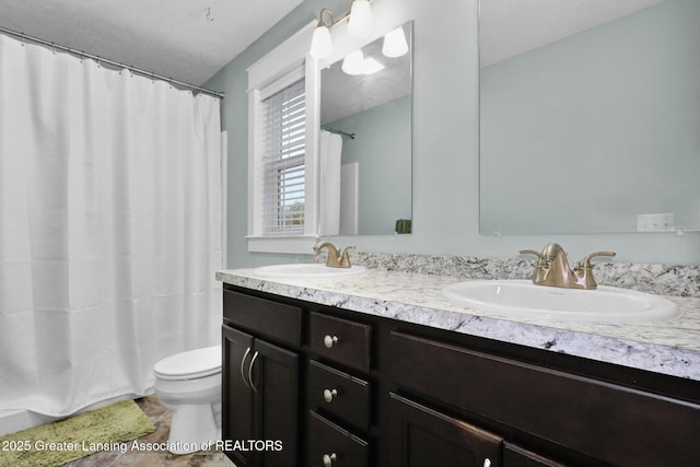 4269 Tamarack St, Holt, MI 48842 - full bathroom with toilet, double vanity, and a shower with shower curtain