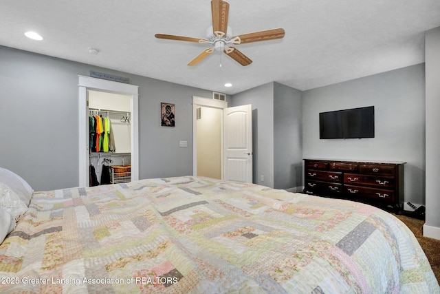 4269 Tamarack St, Holt, MI 48842 - bedroom featuring carpet flooring, recessed lighting, ceiling fan, a walk in closet, and a closet