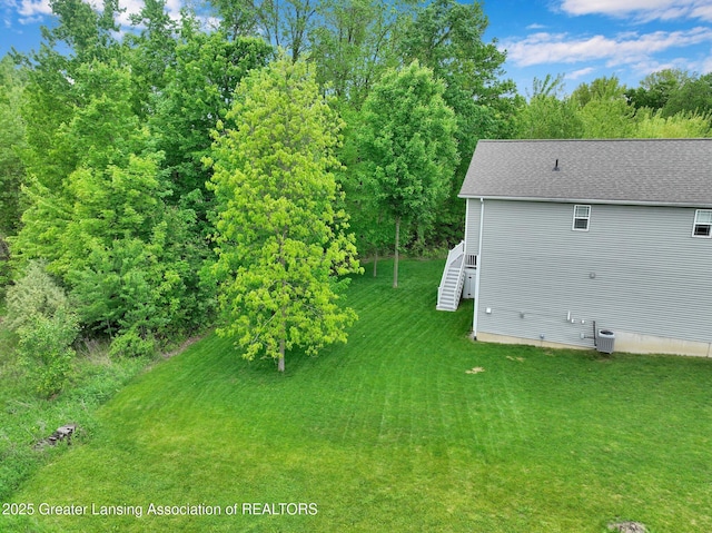 4269 Tamarack St, Holt, MI 48842 - view of green lawn with stairs
