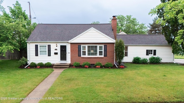 1451 Harvard Rd, East Lansing, MI 48823 - cape cod-style house featuring brick siding, a chimney, and a shingled roof