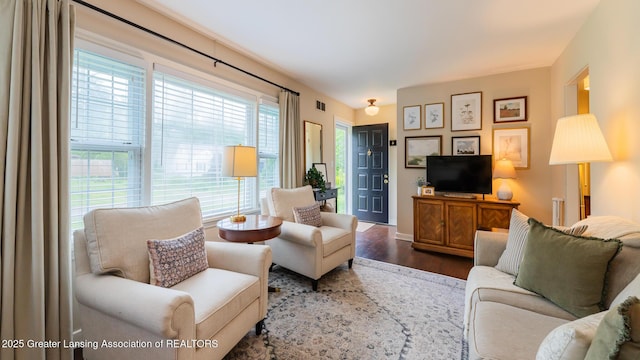 1451 Harvard Rd, East Lansing, MI 48823 - living room with dark wood-type flooring and baseboards