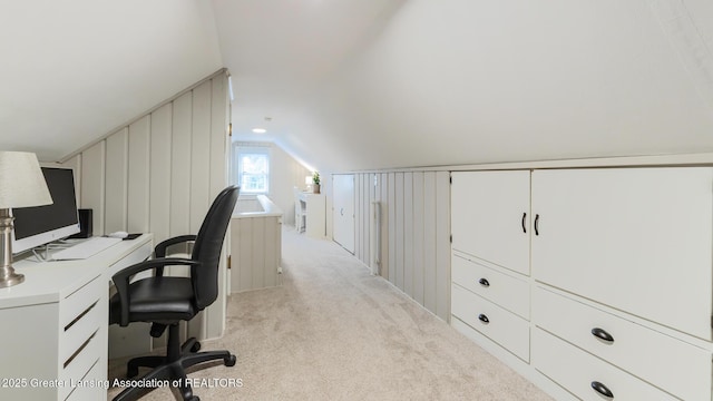 1451 Harvard Rd, East Lansing, MI 48823 - home office with lofted ceiling and light colored carpet