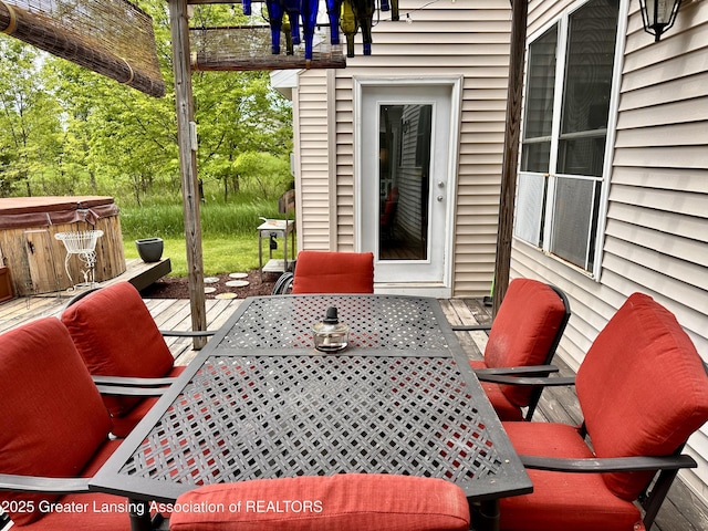 11195 W Herbison Rd, Eagle, MI 48822 - view of patio with a hot tub, outdoor dining space, and a deck