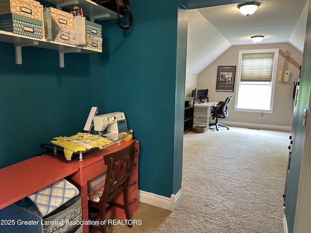 11195 W Herbison Rd, Eagle, MI 48822 - carpeted home office featuring lofted ceiling and baseboards