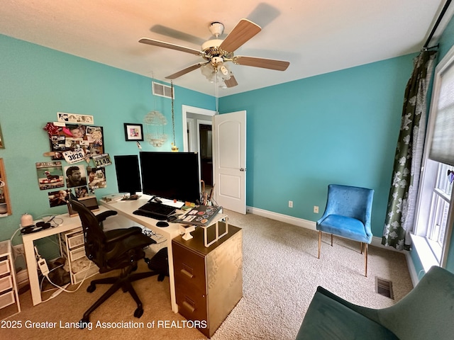 11195 W Herbison Rd, Eagle, MI 48822 - office area with ceiling fan, carpet flooring, and baseboards