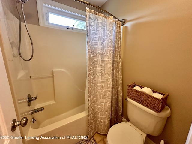 11195 W Herbison Rd, Eagle, MI 48822 - bathroom with shower / tub combo, toilet, and tile patterned flooring
