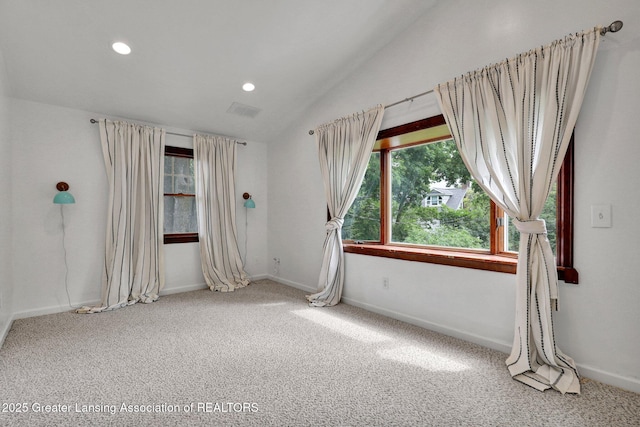 350 Kensington Rd, East Lansing, MI 48823 - carpeted empty room with lofted ceiling, recessed lighting, and baseboards