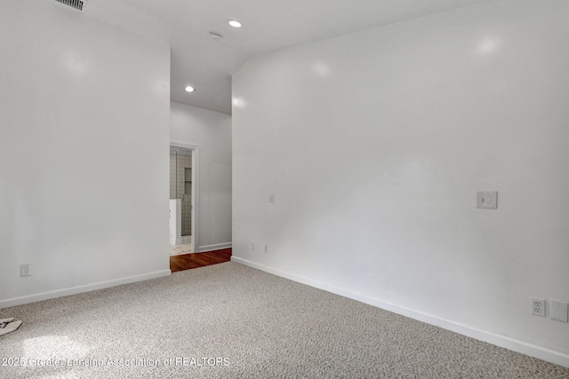 350 Kensington Rd, East Lansing, MI 48823 - carpeted empty room with recessed lighting and baseboards
