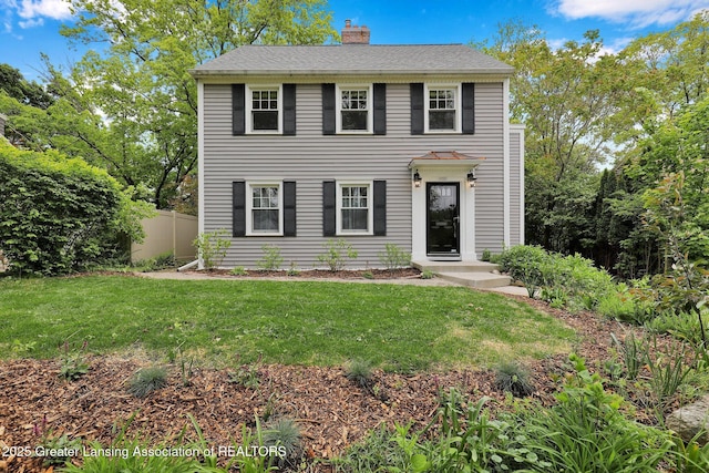 350 Kensington Rd, East Lansing, MI 48823 - colonial home featuring a chimney