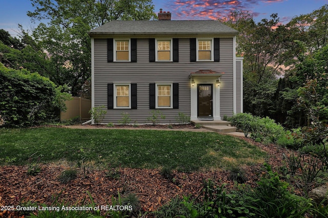 350 Kensington Rd, East Lansing, MI 48823 - colonial-style house with a chimney