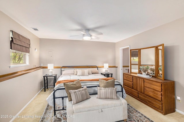 8450 Pineview Lake Dr, Linden, MI 48451 - bedroom featuring light carpet, baseboards, and electric panel