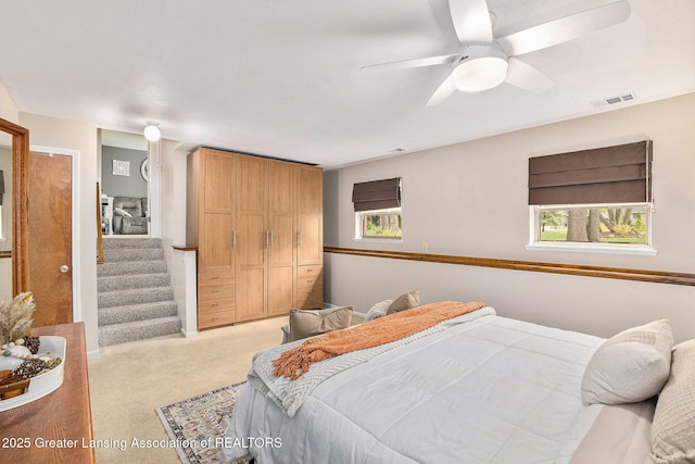 8450 Pineview Lake Dr, Linden, MI 48451 - bedroom featuring carpet and ceiling fan
