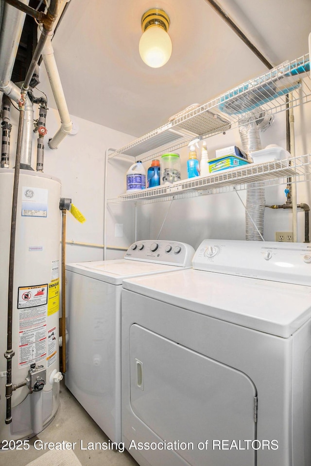8450 Pineview Lake Dr, Linden, MI 48451 - laundry area featuring water heater and washer and dryer
