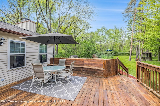 8450 Pineview Lake Dr, Linden, MI 48451 - wooden terrace featuring outdoor dining area and a yard