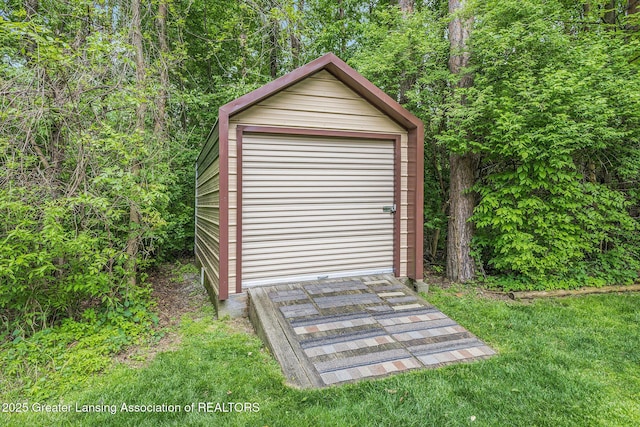 8450 Pineview Lake Dr, Linden, MI 48451 - garage with a storage unit