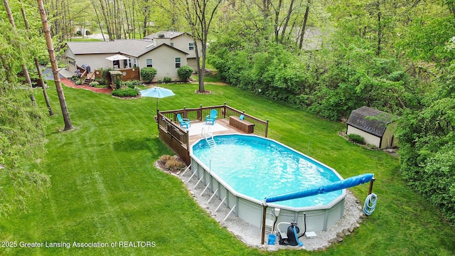 8450 Pineview Lake Dr, Linden, MI 48451 - swimming pool with a deck and a yard