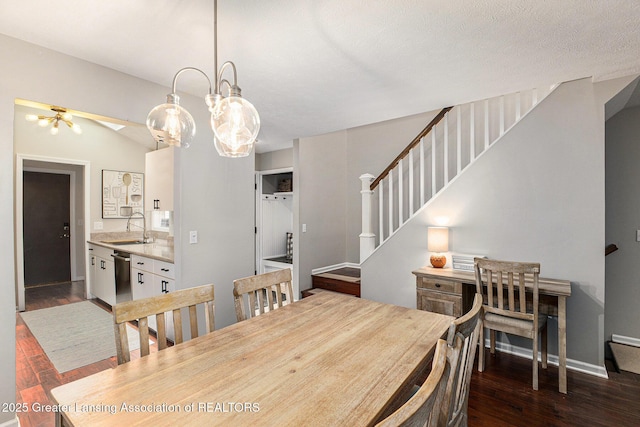 1146 S Ridge Rd, Lansing, MI 48917 - dining room featuring stairs, dark wood-style floors, a ceiling fan, and baseboards