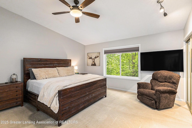 1146 S Ridge Rd, Lansing, MI 48917 - bedroom with carpet flooring, lofted ceiling, baseboards, and a ceiling fan