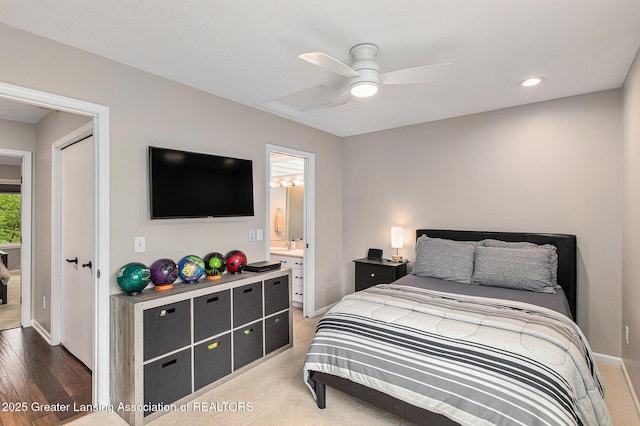 1146 S Ridge Rd, Lansing, MI 48917 - bedroom with baseboards, ensuite bathroom, a ceiling fan, and recessed lighting