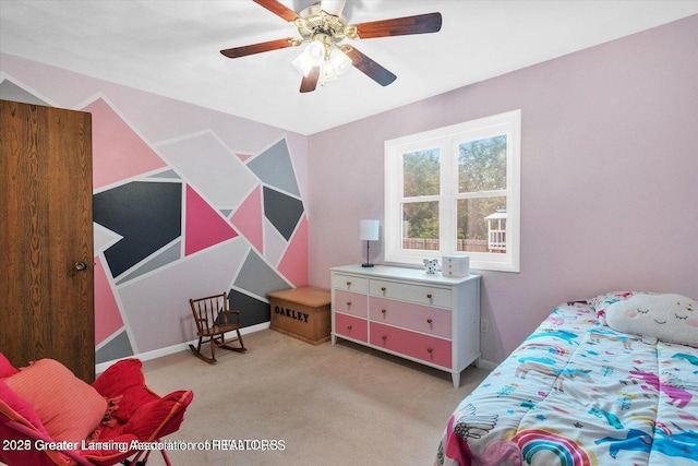 524 Dutch Hill Dr, Lansing, MI 48917 - bedroom featuring light colored carpet and ceiling fan