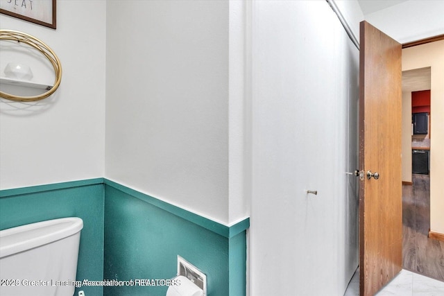 524 Dutch Hill Dr, Lansing, MI 48917 - bathroom with toilet and marble finish flooring