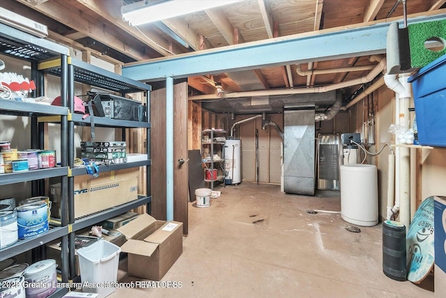 524 Dutch Hill Dr, Lansing, MI 48917 - unfinished basement with water heater, heating unit, and a water softener