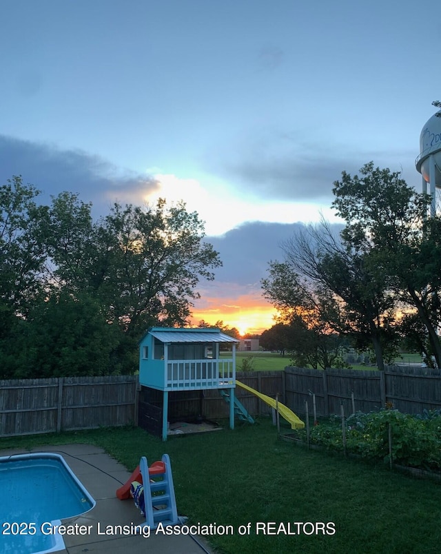524 Dutch Hill Dr, Lansing, MI 48917 - view of yard featuring a playground