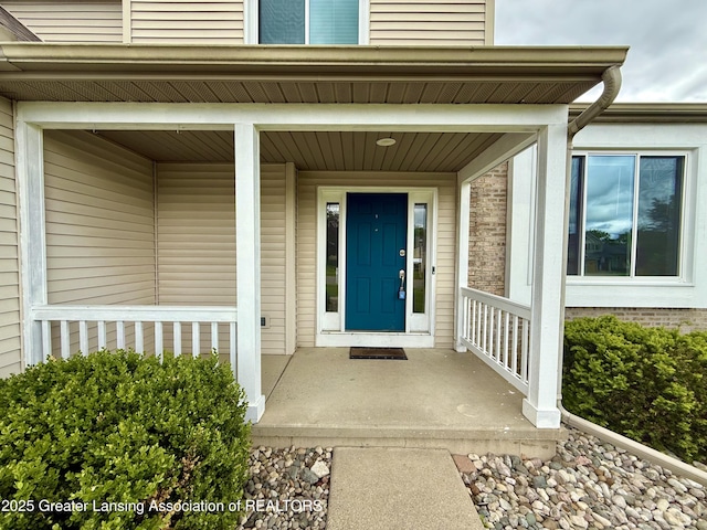 1512 Lindy Dr, Lansing, MI 48917 - property entrance featuring covered porch