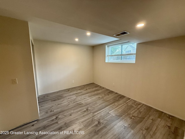 1512 Lindy Dr, Lansing, MI 48917 - basement featuring wood finished floors and recessed lighting