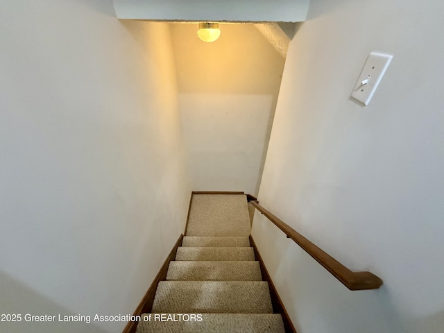 1512 Lindy Dr, Lansing, MI 48917 - stairway featuring baseboards