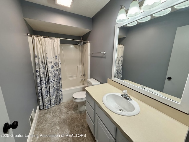 1512 Lindy Dr, Lansing, MI 48917 - bathroom featuring toilet, vanity, and shower / tub combo