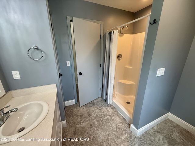 1512 Lindy Dr, Lansing, MI 48917 - full bathroom featuring a shower with curtain, vanity, and baseboards