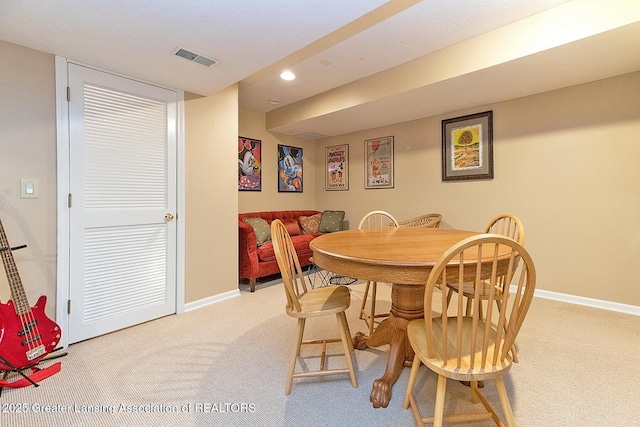 4767 Mohican Ln, Okemos, MI 48864 - dining room with light carpet, baseboards, and recessed lighting