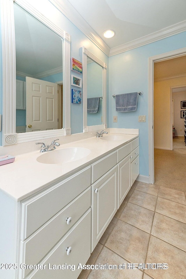 4767 Mohican Ln, Okemos, MI 48864 - bathroom featuring crown molding, double vanity, tile patterned flooring, and recessed lighting