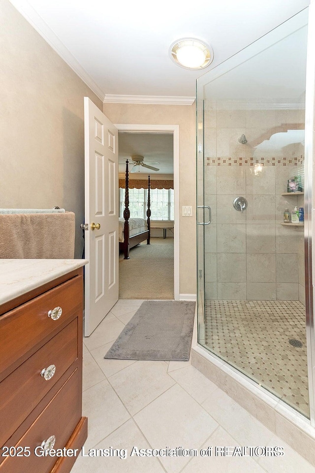 4767 Mohican Ln, Okemos, MI 48864 - bathroom with vanity, a stall shower, tile patterned flooring, ensuite bathroom, and ornamental molding
