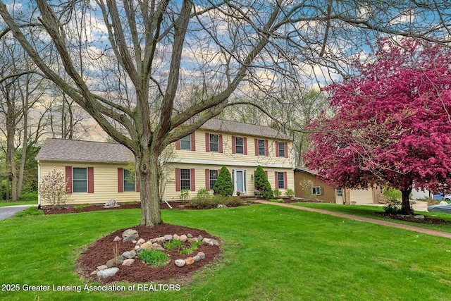 4767 Mohican Ln, Okemos, MI 48864 - view of front of home with a front lawn